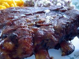 After about 6 hours of smoking, you'll remove the ribs and liberally coat both sides of the ribs with bbq sauce. Low Slow Oven Baked Ribs Recipe 4 1 5