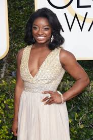 What happened to simone biles in 2017. Simone Biles Wears Gold Gown At The Golden Globes 2017 Teen Vogue