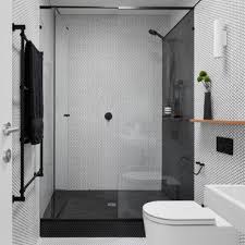 This tiny bathroom is made to feel much larger by the inclusion of mirror all around the room. Matte Black Bathroom Ideas Houzz