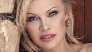 Pamela Anderson marries Jon Peters: Insider her traumatic past