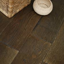 Any solid wood flooring will be better than a laminate. Colours Rondo Antico Solid Oak Flooring 1 17m Pack Diy At B Q Solid Oak Floors Solid Wood Flooring Flooring