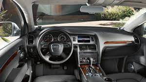 Automotive Independence The Audi Q7 With Permanent Four Wheel Drive The Largest Luggage Space In Its Class And A Versatile Inte Audi Q7 Audi Audi Q7 Interior