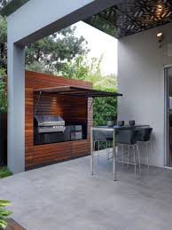 This small grill area looks so lovely with few decorations from string lights to colorful and patterned privacy curtains. 30 Backyard Bbq Area Design Ideas