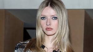 Apple Martin joined by Gwyneth Paltrow and Chris Martin for debutante ball  in Paris