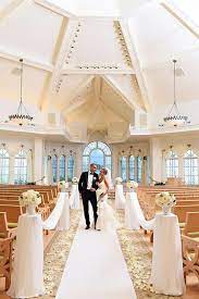 Sophisticated And Classic Ceremony Decor At Disney S Wedding Pavilion Disney World Wedding Disney Wedding Disney Fairy Tale Weddings