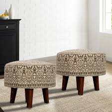 If you have little ones, consider skipping the sharp corners of a coffee table and try a group of poufs instead. Nestroots Cotton Canvas Side Stool Printed Ottoman Upholstered Foam Cushioned Pouffe Puffy Coffee Table For Living Room With 4 Wooden Legs 14 Inch Height Grey Set Of 2 Amazon In Furniture