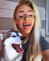 Image may contain: 1 person, dog