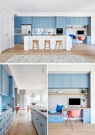A Wall Of Light Blue Kitchen Cabinets Adds A Colorful Touch To This Renovated House Light Blue Kitchens Blue Kitchen Cabinets Blue Kitchens