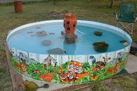 I've converted my 5,000 gallon cement & rock pond (that has large cracks) into a wading pond. My New Kiddie Pool Pond Kiddie Pool Pond Kiddie Pool Pond