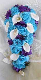 Check out this wedding bouquet with purple roses and see more inspirational photos on theknot.com. Malibu Blue White And Royal Purple Cascade Wedding Bouquet 12pc Free Small Toss In 2020 Purple Wedding Flowers Wedding Flowers Purple Blue Royal Purple Wedding