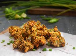 Spring Onion Pakora Recipe Made In Kuzhi Paniyaram Pan Recipe Recipes Spring Onion Recipes Indian Food Recipes