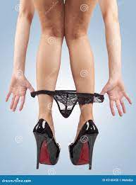 Legs pulling panties down. stock photo. Image of hands - 45160450
