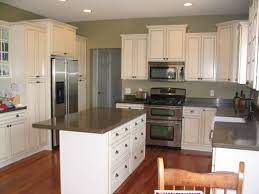 Green kitchen cabinets at the bottom and white ones at the top…what a chic combination, especially when. Pin On Kitchen