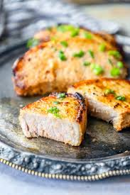 Pork chops baked in the oven are a great and easy meal made with simple pantry ingredients, and only takes about 30 minutes from start to finish! Easy Baked Pork Chops Recipe Sweet Cs Designs