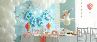 A modern take on the classic stork themed baby shower looks fresh and updated with a bright color scheme and … Stork Themed Baby Shower With Clouds Hot Air Balloons And Rainbows Fun365
