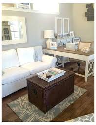Doing so opened up square footage in the center of the space making the room feel open and airy instead. No Room For A Home Office But Wait Very Small Tv Room Ideas Cozy If You Do Living Room Office Combo Guest Room Office Combo Home Office Guest Room Combo
