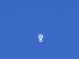 What is the balloon flying across the Front Range sky?