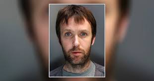 Psychologist who murdered his mum and stole her money told to pay £100,000 