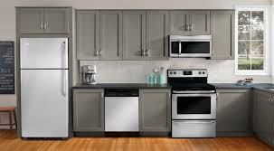 Grey Kitchen Cabinets With White Appliances And Oak Flooring Modern Kitchen Design Kitchen Design White Kitchen Appliances