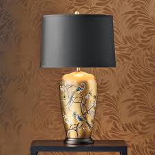 Italian tole table lamp gilded with porcelain rose marble base. Sakura Porcelain Table Lamp Cherry Blossoms And Birds Of Paradise On Gold Finish Black Fabric Shade Asian Style Design Lamp Tra Lamp Lamp Decor Asian Lamps