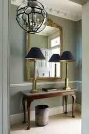 A beautiful entrance foyer creates a wonderful feeling and undoubtedly creates an amazing impact on the individual entering the building of course. Large Mirror Foyer Ideas With Table Lamps Brabbu Design Forces