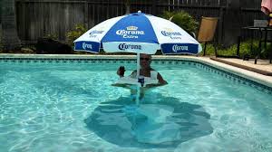 Diy Umbrella Table For Pool Just Took A Plastic Umbrella Base Filled With Sand Added An Umbre Diy Swimming Pool Swimming Pool Designs Cool Swimming Pools