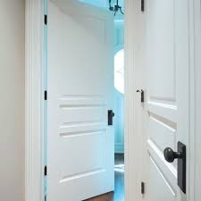 Three Panel Door With Iron Doorknob I Like The Rectangular Face Of The Hardware White Interior Doors Doors Interior Traditional Interior Doors