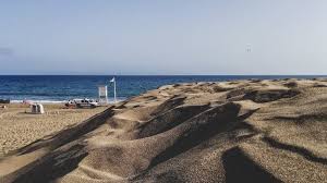 A boy is playing in the bathtub while wearing only underwear. Nudism In Gran Canaria 5 Best Naturist Beaches In Gran Canaria