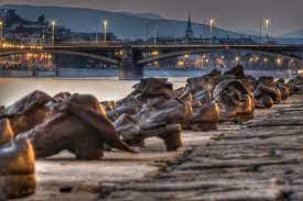 However, the 60 pairs of shoes lining up on the danube bank are about remembering dreadful events rather than taking pleasure in art: Budapest Shoes On The Danube Bank Memorial