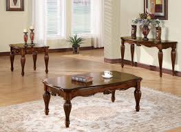 A coffee table is a low table designed to be placed in a sitting area for convenient support of beverages, remote controls, magazines, books (especially large, illustrated coffee table books), decorative objects, and other small items. Dreena Traditional Coffee Table