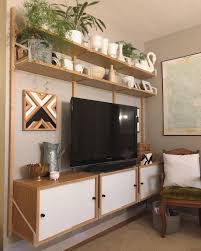 Janine P On Instagram Slight And Subtle Ikeahack To Our Svalnas Wall Unit With Living Room Entertainment Center Ikea Living Room Ikea Entertainment Center