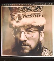 Are there any artists or bands that sound similar to what Elvis' first  three albums sound like? Im a huge fan of all his work, but something about  his first three are