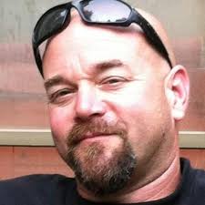 A juicy burger topped with fried chicken and smoked bacon, aptly named the  “Whole Tuckin' Farm”.