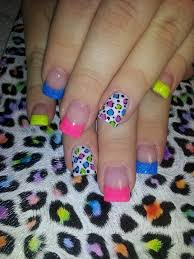 Cheetah print or leopard print, is a great way to express your love for wildlife in particular. Multi Colored Leopard Cheetah Nail Designs Leopard Print Nails Animal Print Nails