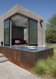 Wall surrounding patio (terracing) provides shelter and a place for fountain to spill into pond. 14 Reflection Pool Ideas Water Features In The Garden Landscape Design Water Features