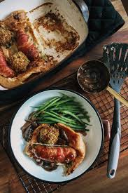 It typically consists of sausages (the toad) and batter (the hole). Polly Vadasz Levelled Up Toad In The Hole