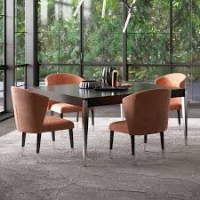 He started with the spacing of the columns on a greek temple, using that distance as a module. according to his instructions for achieving symmetry, harmony, and proportion, the base of a doric column should be two modules and the height should be fourteen modules. 10 Striking Black Dining Tables For Your Modern Dining Room