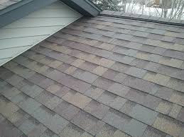 A 130mph wind rated lifetime shingle in color: Owens Corning Teak Yakesh Roofing