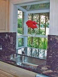 The two main types of greenhouse windows are awning windows and casement windows. Greenhouse Windows For Kitchen Counter Flows Into The Bottom Of The Window An Optical A Greenhouse Kitchen Kitchen Garden Window Kitchen Renovation Pictures