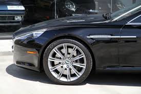 Image result for Jet Black 2010 Aston Martin