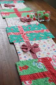 20 Christmas Sewing Projects To Make Positively Splendid Sewing Christmas Gifts Holiday Table Runner Christmas Sewing Projects