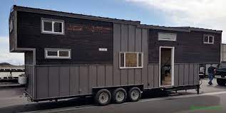 The Tiny Giant Tiny House Towns Tiny House Wood Stove Tiny House Bathtub