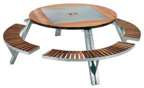 This set features a round dining table and four dining chairs. Extremis Gargantua Round Table Natural Wood Metal Made In Design Uk