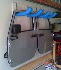 In this video i am sharing how to create this spring umbrella door hanger! Diy Door Hanger Jeep Jk Jeep Doors Jeep Hardtop Storage