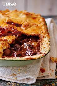 This Recipe Turns A Classic French Beef Stew Into A Delicious Pie Complete With Golden Pastry Top With A Rich Combina Recipes Beef Bourguignon Delicious Pies