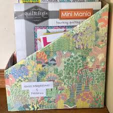 We glued our boxes and let them dry overnight with the help of some heavy objects from around the house (like wine bottles, heavy books etc.) if this is a part that you would rather skip, there are ready made cardboard magazine files that you can buy and still make them custom by choosing your own paper/bookcloth to wrap them with. Easy Diy Magazine Holders Made From Cereal Boxes Upcycle My Stuff