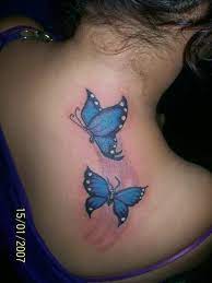 Pin By Ashley Hadden On Geek Butterfly Back Tattoo Blue Butterfly Tattoo Butterfly Tattoo