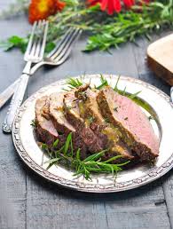 Beef tenderloin marinated in a red wine, soy & ginger marinade. Southern Bourbon Glazed Beef Tenderloin Recipe The Seasoned Mom