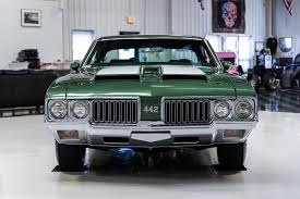 Image result for Scaraba Green 1930 Oldsmobile