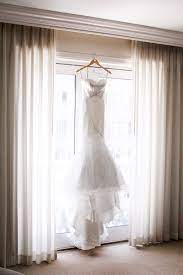 10 Wedding Dress Shots You Didn T Know You Needed Hanging Wedding Dress Wedding Dress Photography Wedding Details Photography